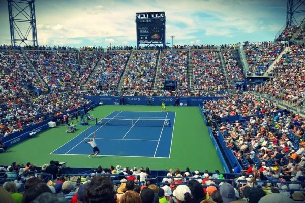 tennis stadium crowd night match